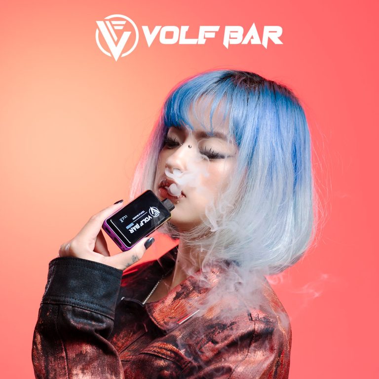 a girl holding a vaper under the pink background-VB-15
