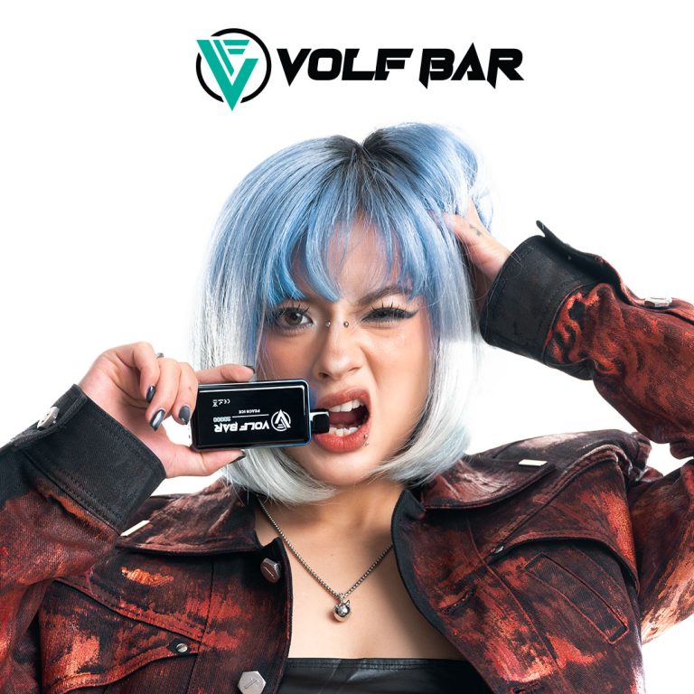 a girl holding a disposable vape